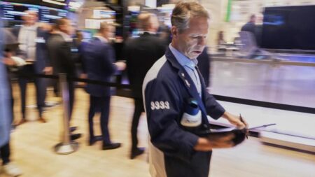 Wall Street Cautiously Navigates a Busy Week of Earnings and Economic Data