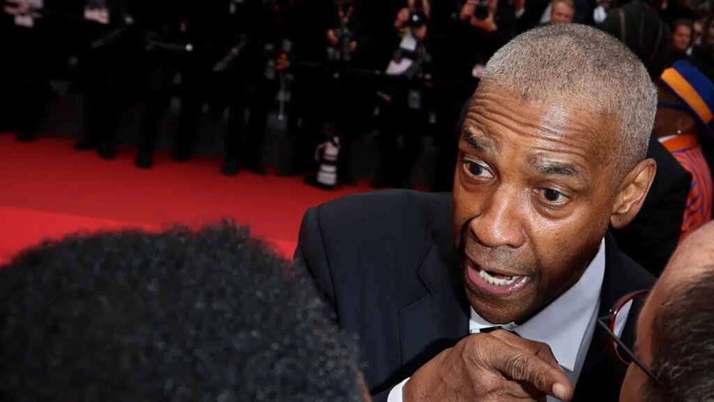 Denzel Washington denies leaving Cannes early after red carpet confrontation