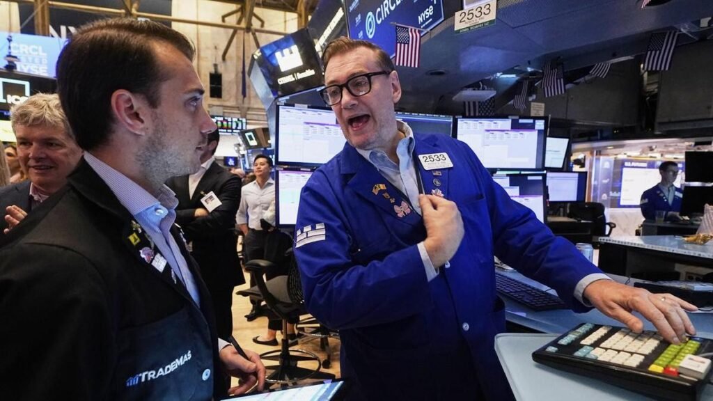 Wall Street Climbs on Hopeful Jobs Report as Tesla Bounces Back